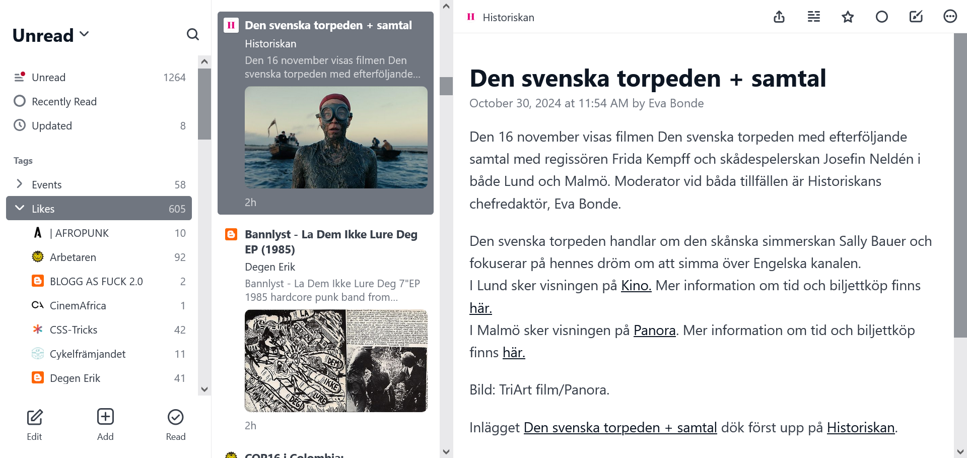 Skärmdump av Feedbin i inloggat läge. I vänsterkolumnen syns kategorier, i mittenkolumnen syns inlägg från en viss kategori och i den stora högerkolumnen syns en fullständig artikel.